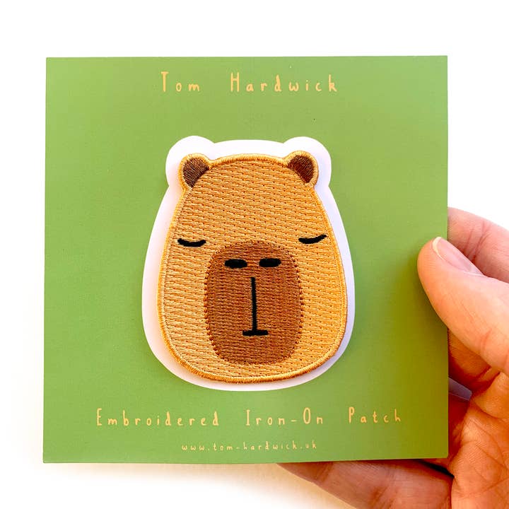 
                      
                        Capybara Head, Woven Iron-on Patch
                      
                    