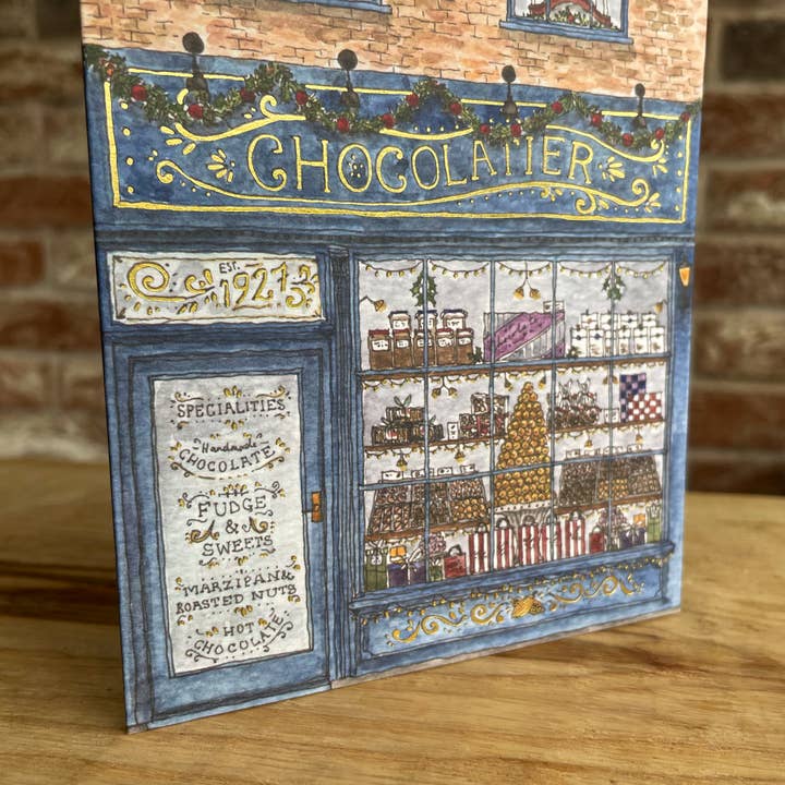 
                  
                    Brittany Davies Illustration Winter Chocolatier Hot Foiled Christmas Card
                  
                