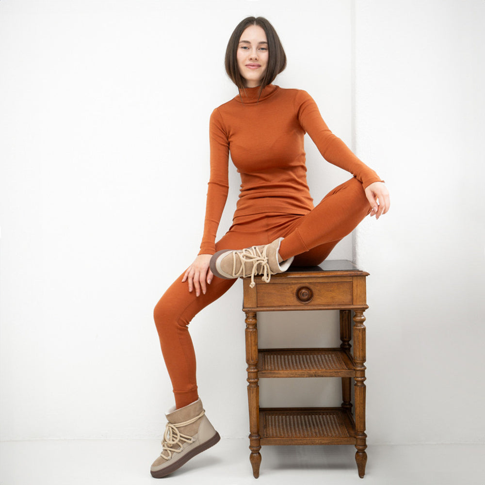 
                  
                    Minimalisma Women's 100% Merino Long Sleeve Turtleneck Top - Rust
                  
                