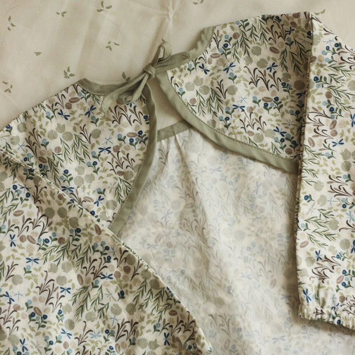 
                  
                    Avery Row Sleeved Organic Cotton Bib - Riverbank
                  
                