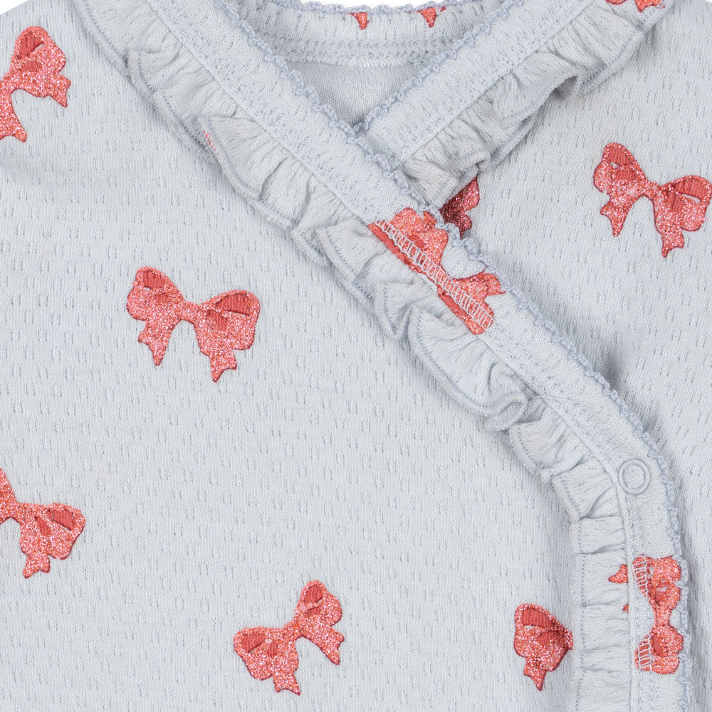 
                  
                    Konges Sløjd Sui Long Sleeve Frill Body - Rosia Blue Bow
                  
                