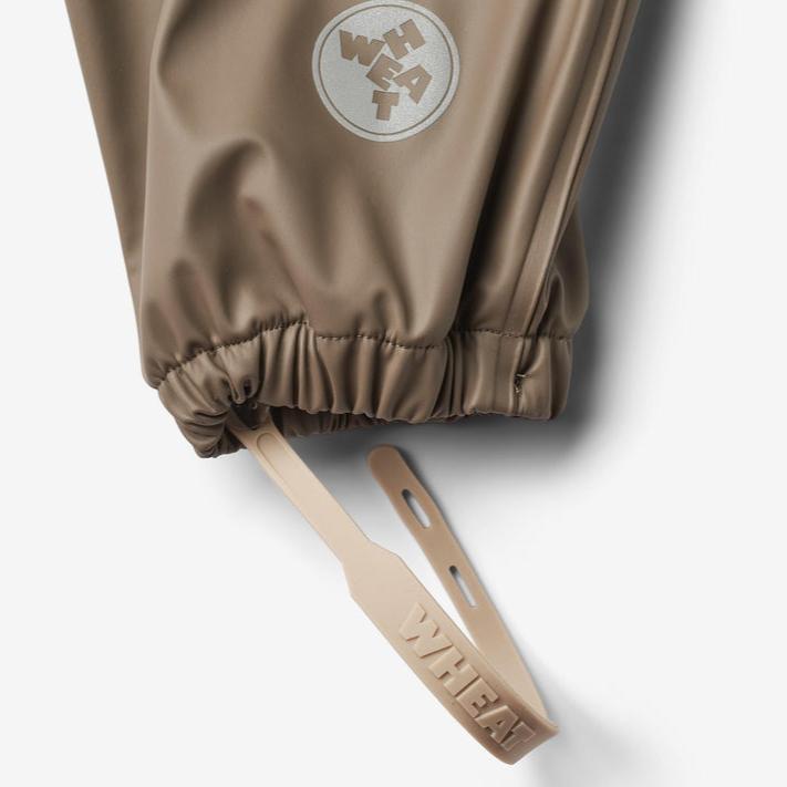 
                  
                    Wheat Clothing Rainsuit Mika - Dry Wood
                  
                