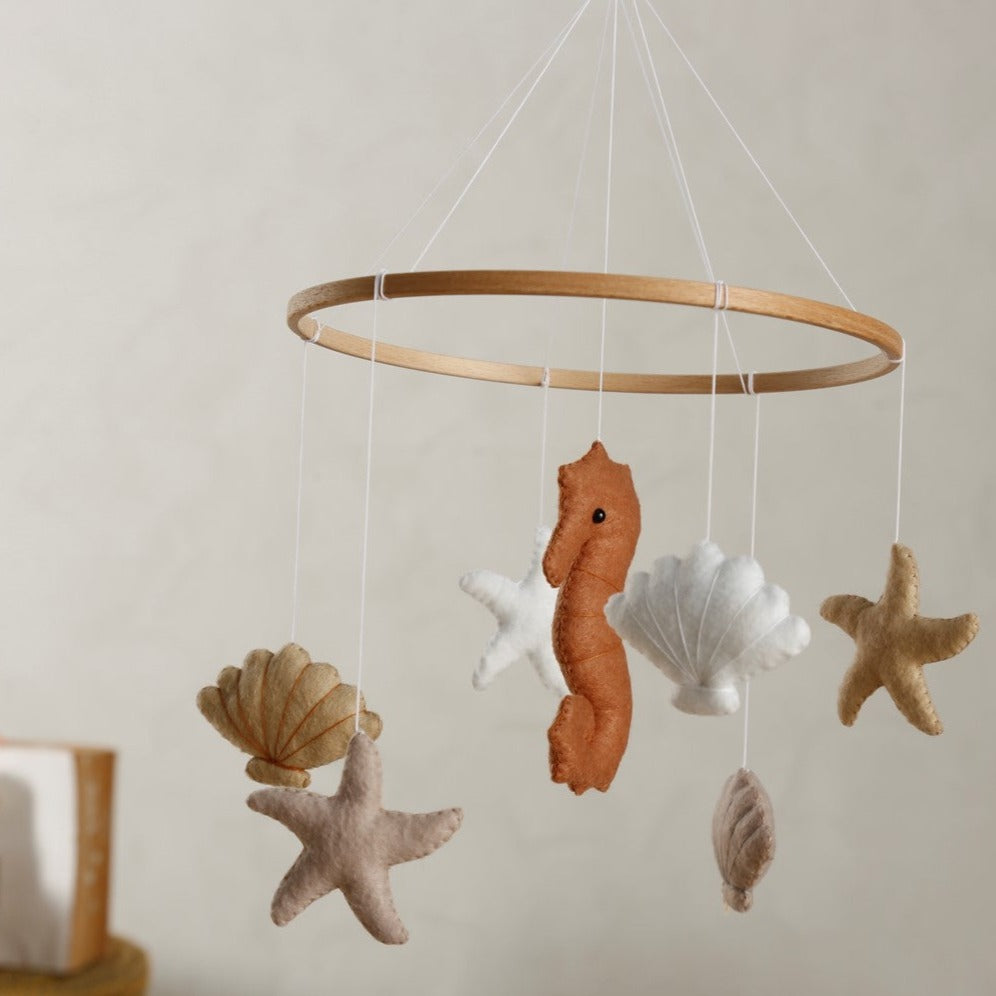 
                      
                        2 Stories SEA Beachy Felt Mobile
                      
                    